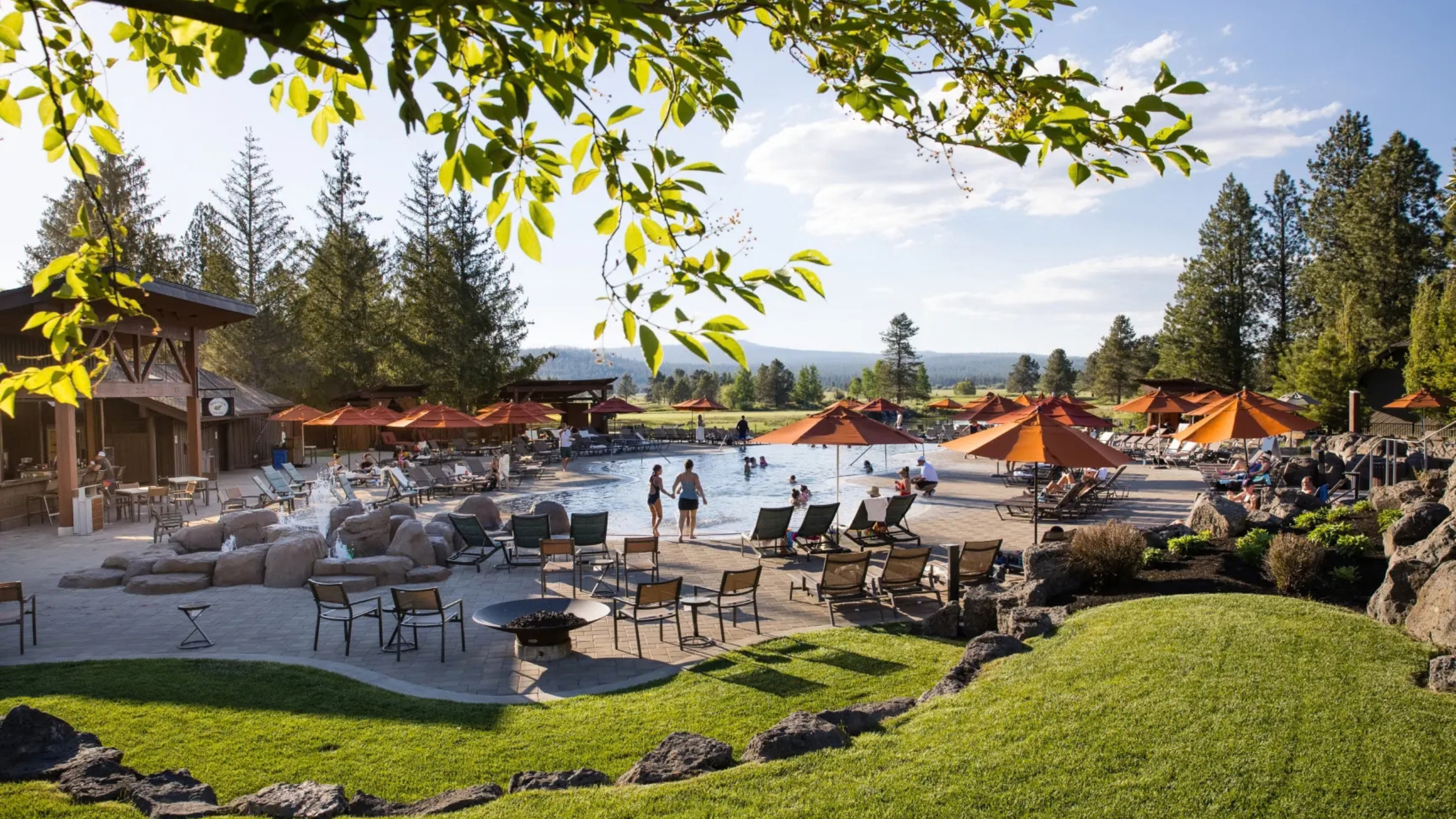 A sunset picture of Sunriver Resort pool and outdoors - Aven Hospitality